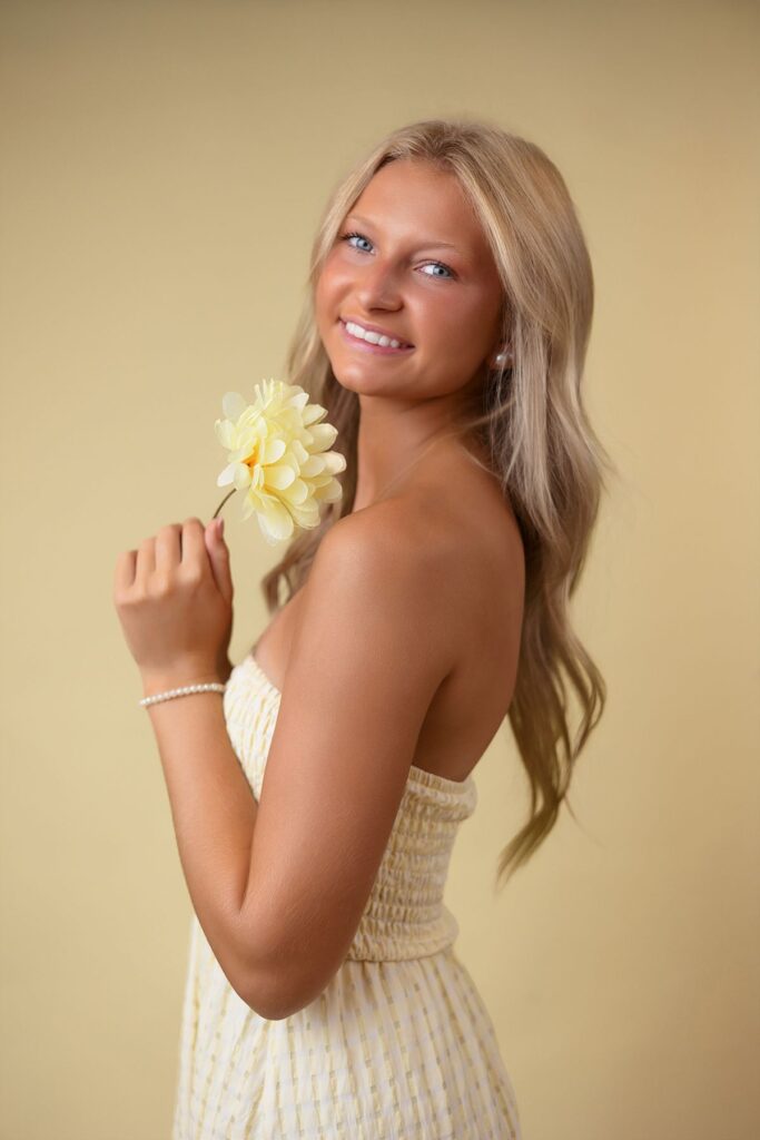 yellow flowers senior portrait